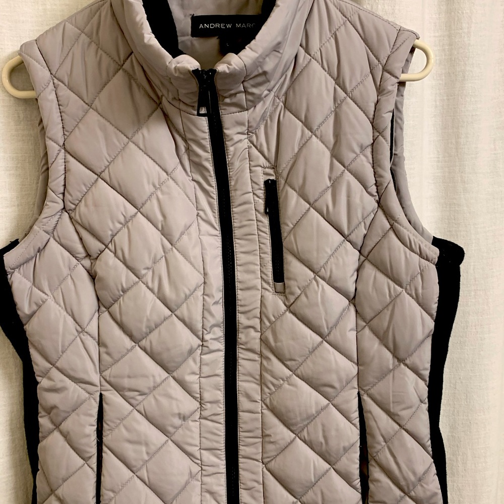 Andrew Marc $9